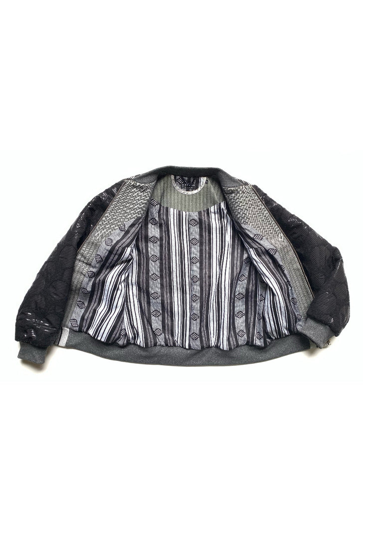 bomber réversible ouverte sur le devant avec la doublure en coton wax à motifs graphiques