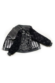 bomber réversible en patchwork de tissus noirs et gris à motifs graphiques