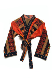 Cache-coeur orange Dahlia patchwork de jerseys velours et jacquardt encadrés de motifs Art Déco