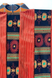 cache-coeur orange patchwork mailles velours côtelé et tricot Jacquardt à motifs fleuris encolure imprimé vintage Art Déco, détails des tissus.