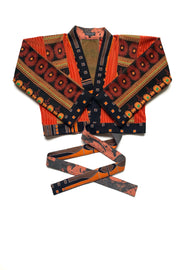 cache-coeur en patchwork de mailles velours et tricot Jacquardt à motifs fleuris, ceinture et bordure en laine imprimé Art Déco