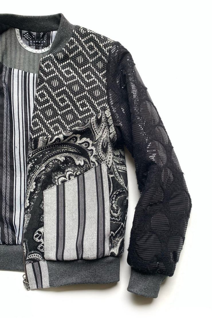 veste bomber noir et gris argenté à motifs géométriques et feuillages
