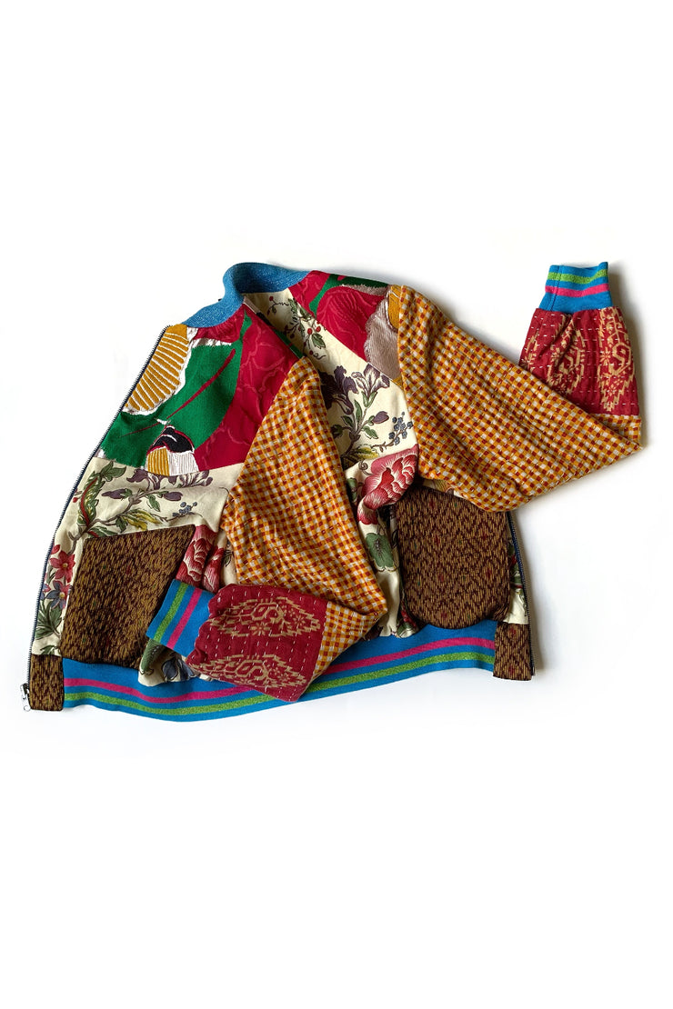 veste bomber réversible en patchwork de motifs fleuris et géométriques